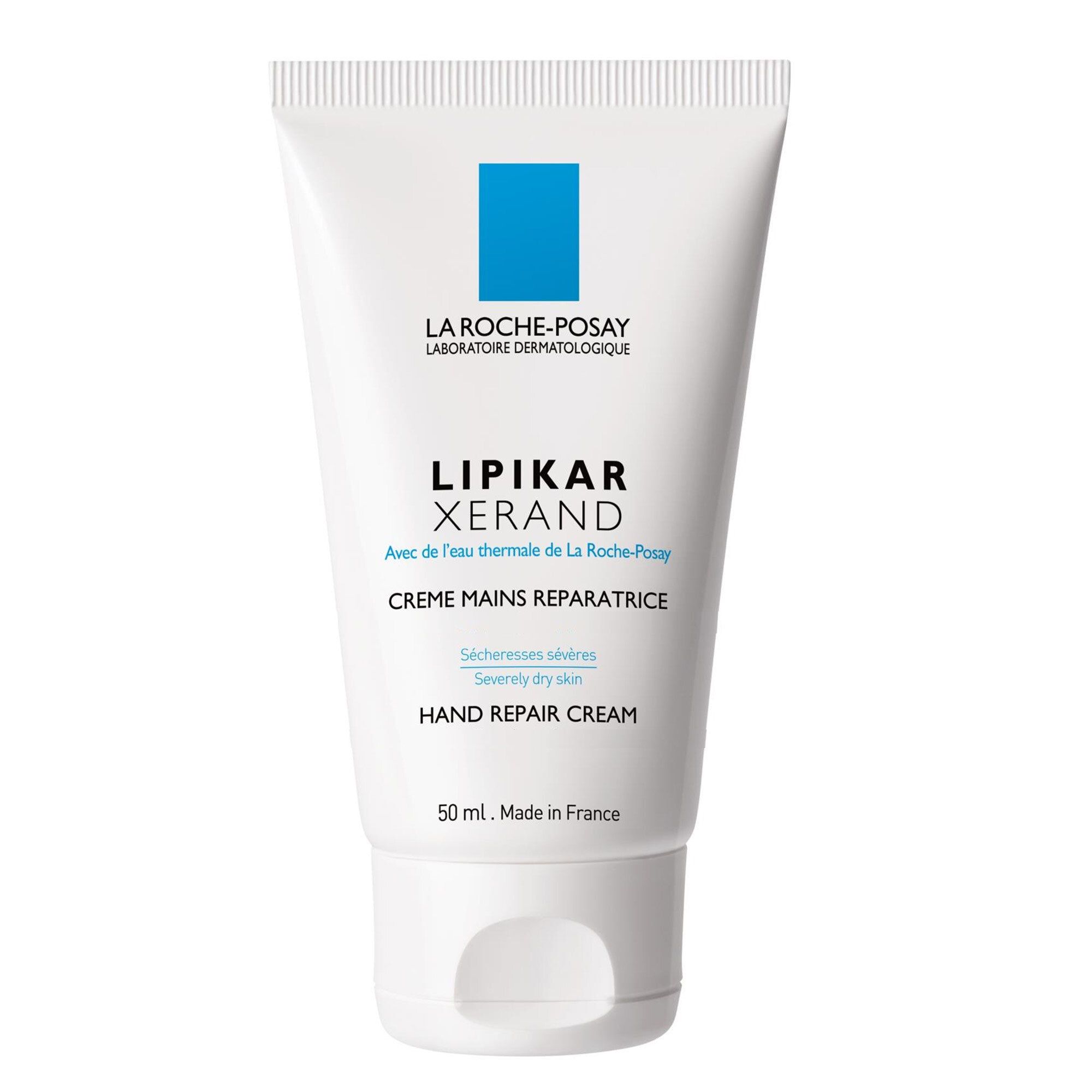 Witte tube La Roche-Posay Lipikar Xerand handcrème. Blauw logo vierkant. Tekst: Hand Repair Cream.