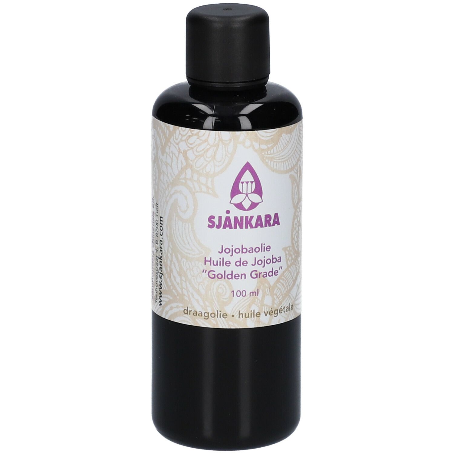 Flacon brun avec bouchon noir. Étiquette avec nom du produit SJANKARA, huile de jojoba et autres informations.