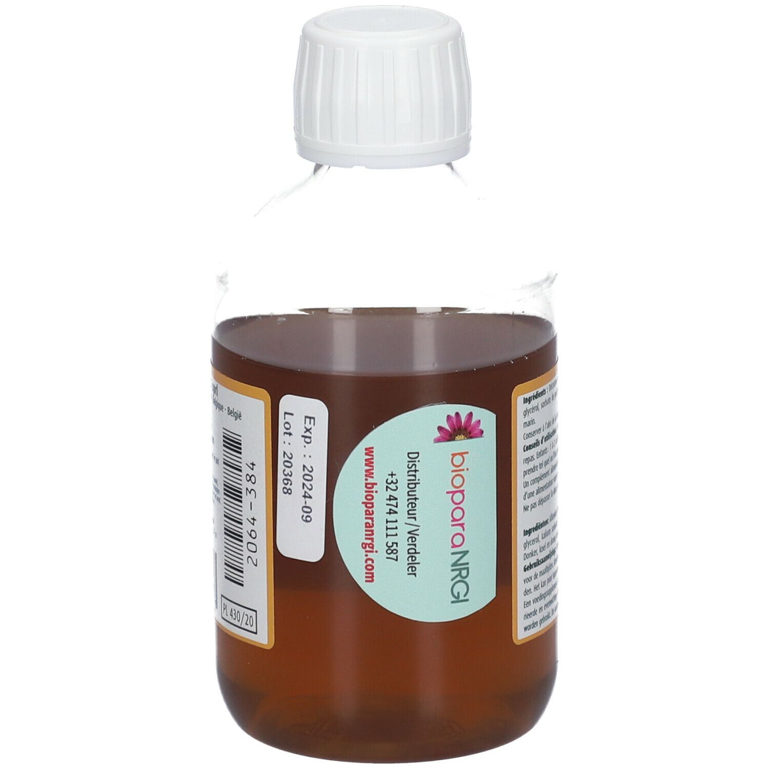 Dos de la bouteille avec liquide brun. Étiquette avec date de péremption et coordonnées. Marque: biopara NRGI.