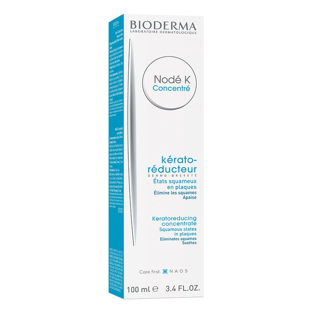 Kartonnen verpakking. Wit met blauwe tekst. Opschrift: BIODERMA, Nodé K Concentré, kérato-réducteur. 100 ml.