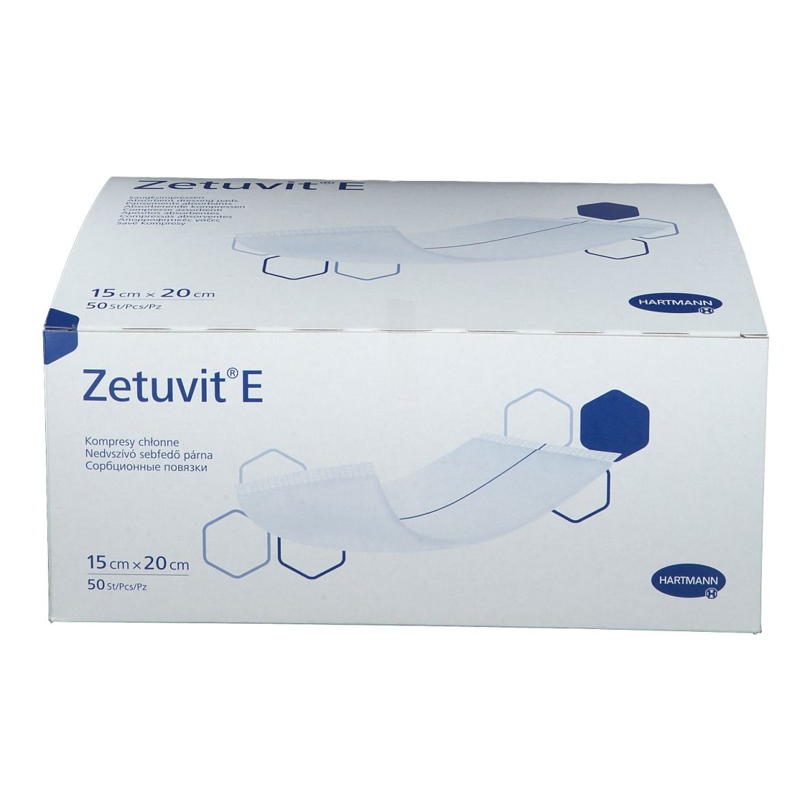 Boîte Zetuvit® E, 15 cm x 20 cm. Boîte blanche avec nom et dimensions du produit. Inscriptions multilingues.