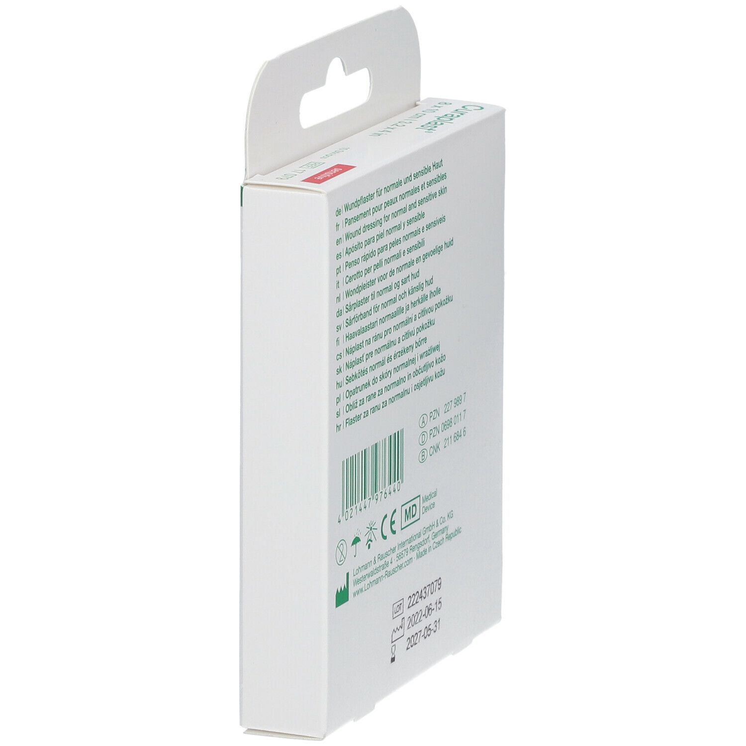 Côté de l'emballage Curaplast® sensitiv. Texte multilingue. Informations de fabrication.