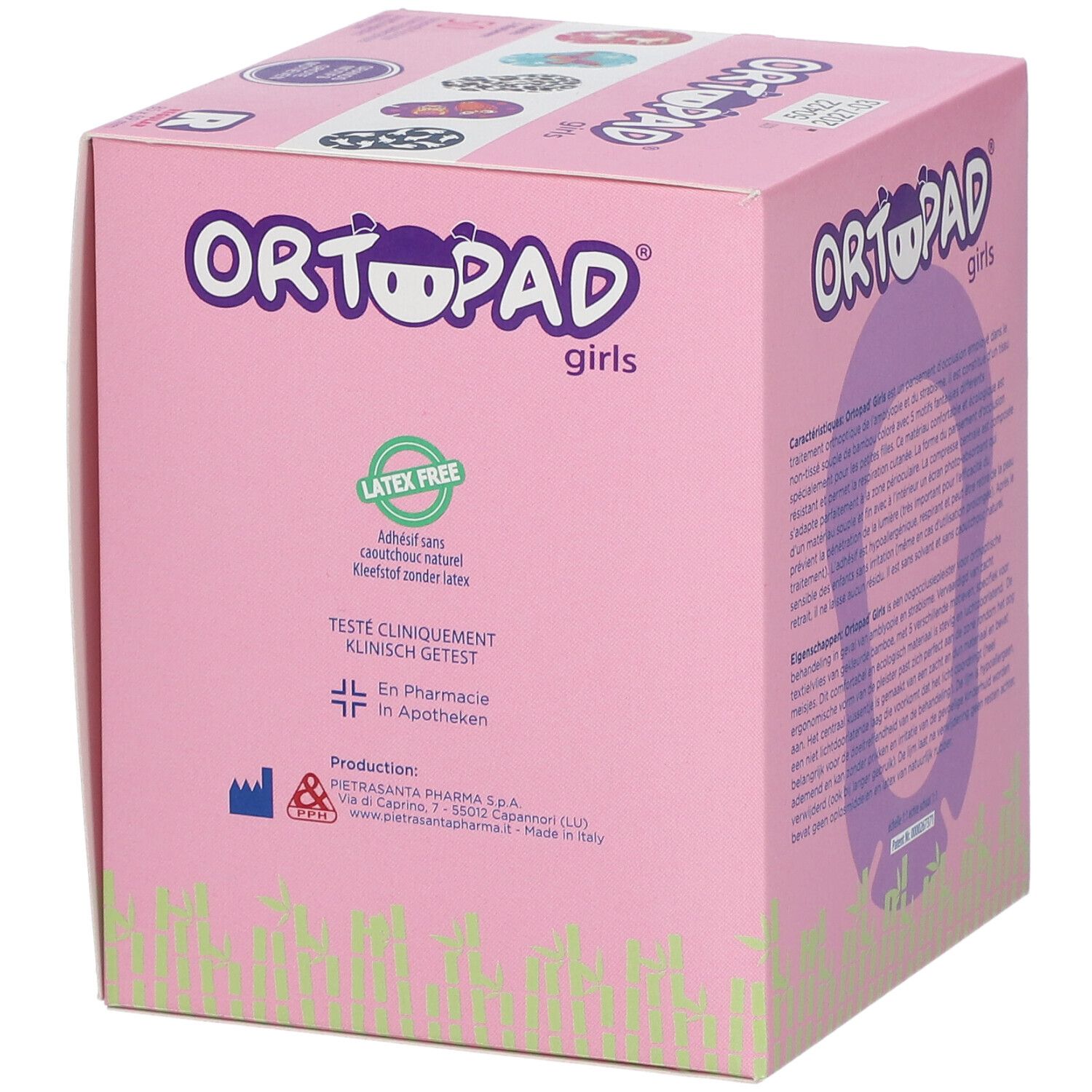 Boîte rose avec impressions. Impression : Ortopad Girls. Contient des informations et des symboles.