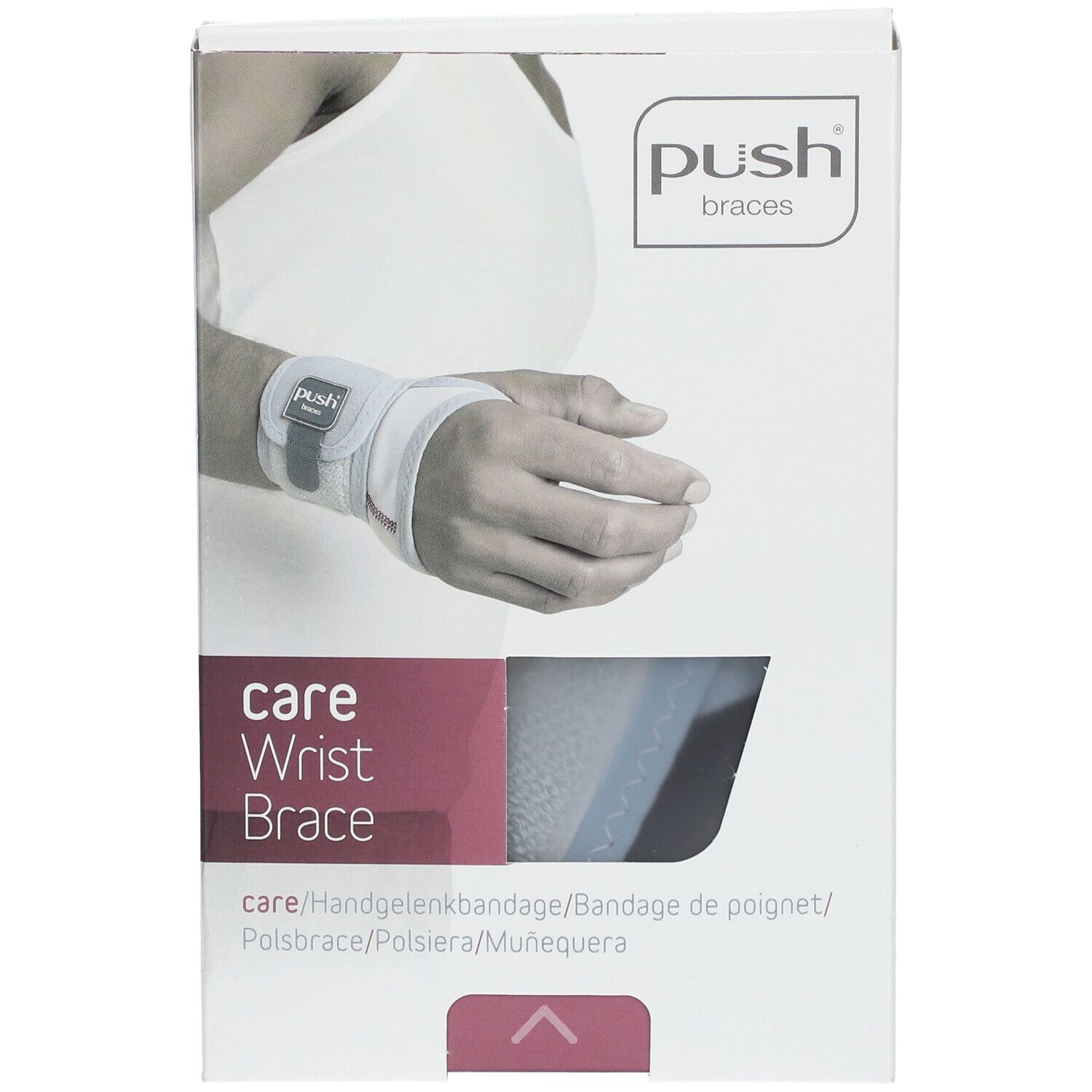 Verpakking van de Push Care polsbrace. Witte doos met productafbeelding en merknaam. Tekst: Care Wrist Brace.