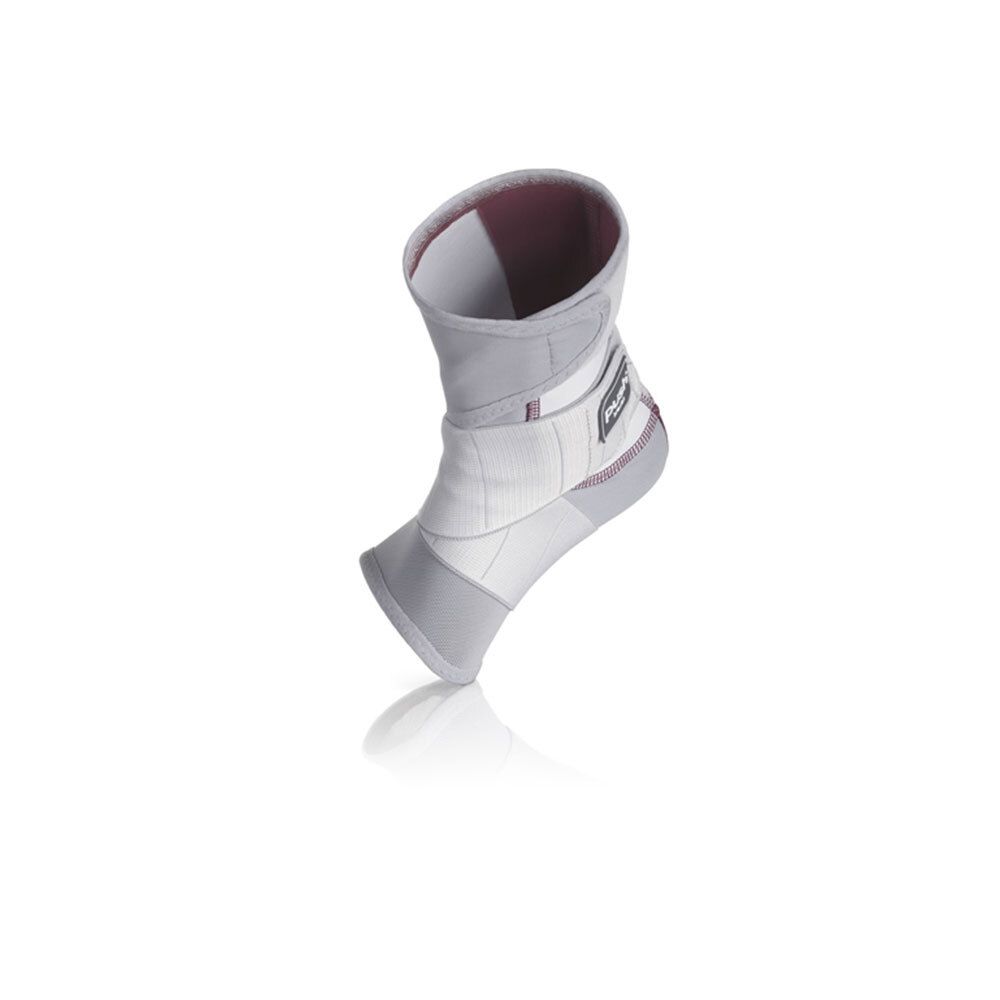 Attelle de cheville grise sur mannequin. Fermeture velcro et logo Push. Pour chevilles 38-41cm.