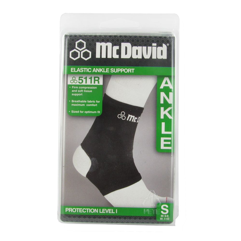 Attelle de cheville élastique noire, en emballage. Marque McDavid. Taille S. Visible : 511R, tissu respirant.