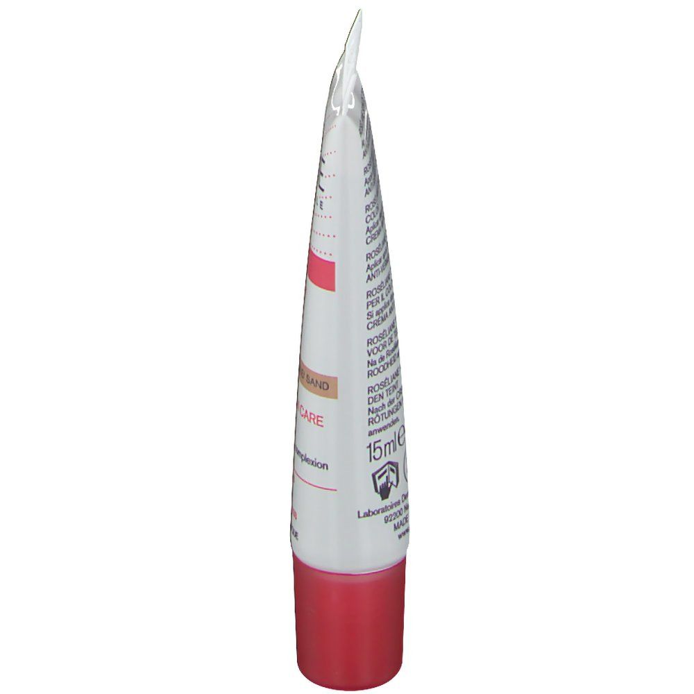 Creme-Tube, weiß mit rosa und roter Schrift. 15ml. Produktname und Marke sichtbar.