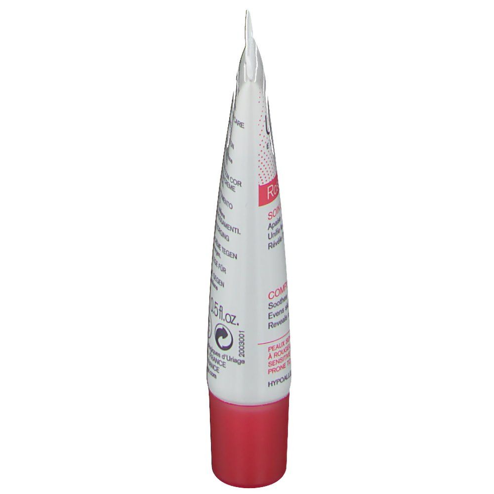 Tube Uriage Roséliane Soin de Teint Doré, vue latérale. Tube blanc et rose avec bouchon rouge. Texte visible.