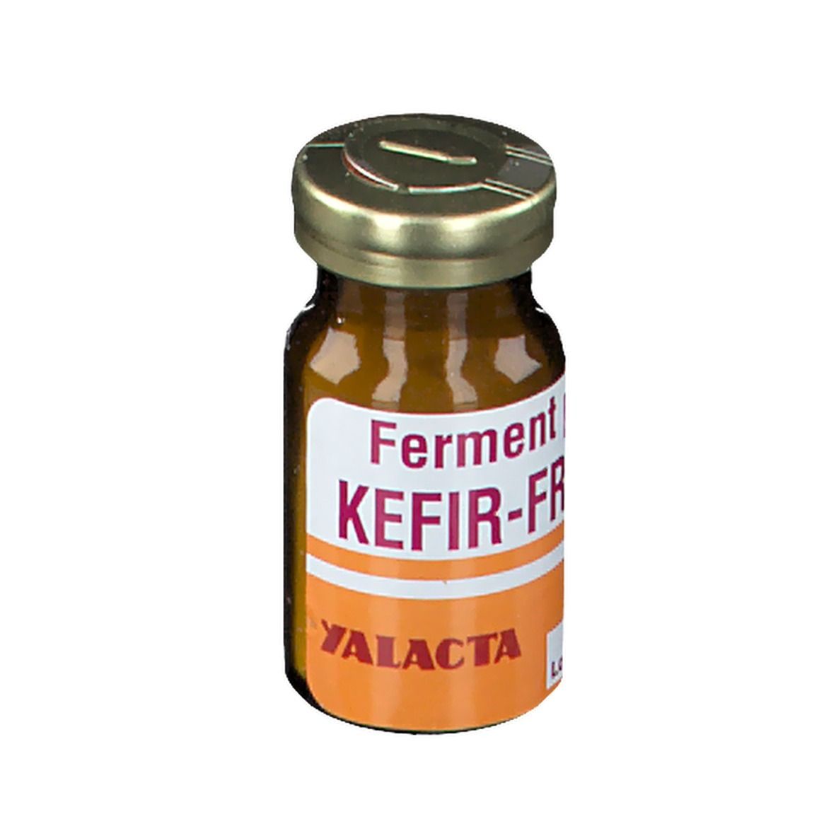 Flacon en verre brun avec bouchon doré. Étiquette avec texte: Ferment po KEFIR-FR. YALACTA. Bande orange.