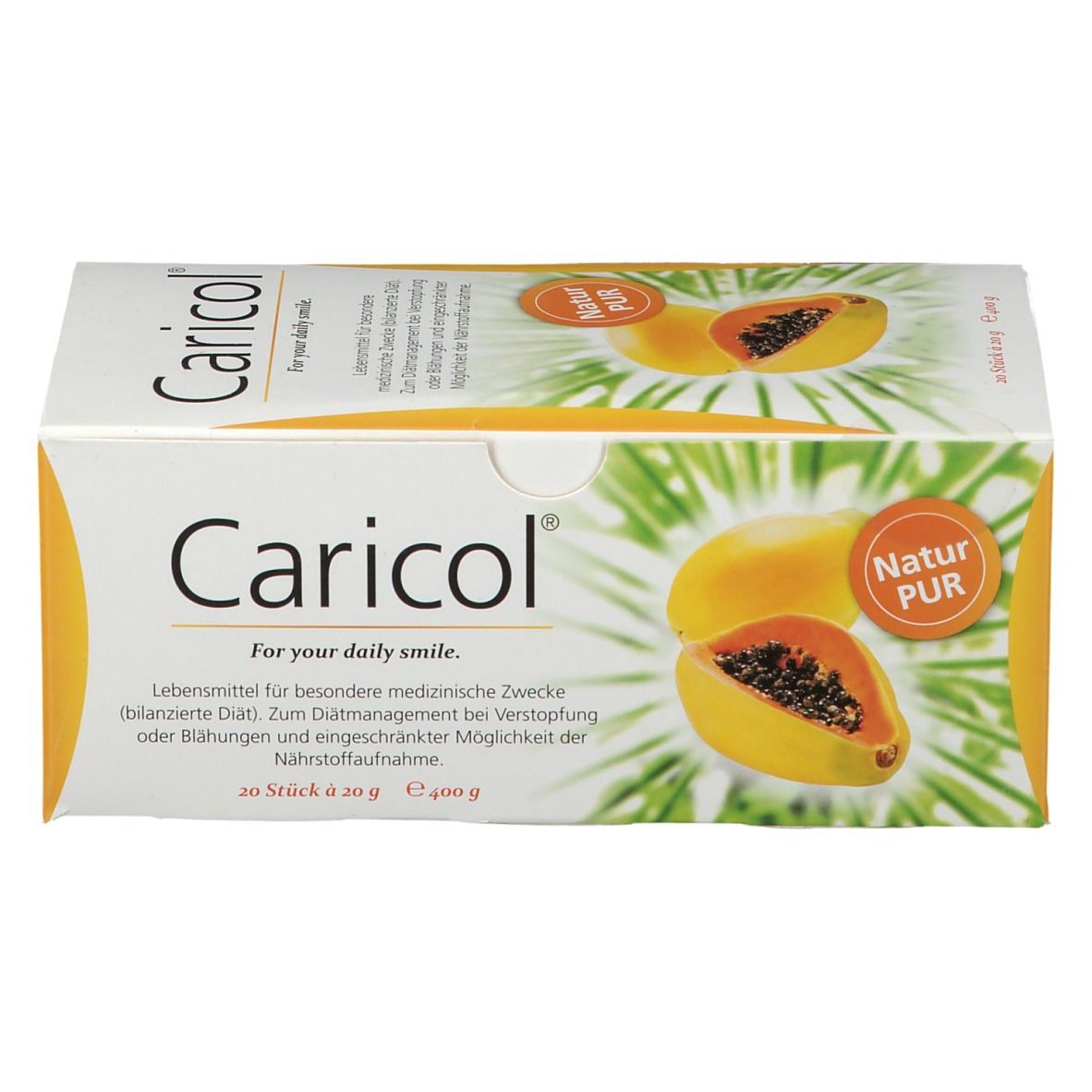 Weißer Karton mit Caricol-Logo und Papaya-Abbildung. Text: "Für Ihr tägliches Lächeln". Enthält 20 Sticks à 20 g.