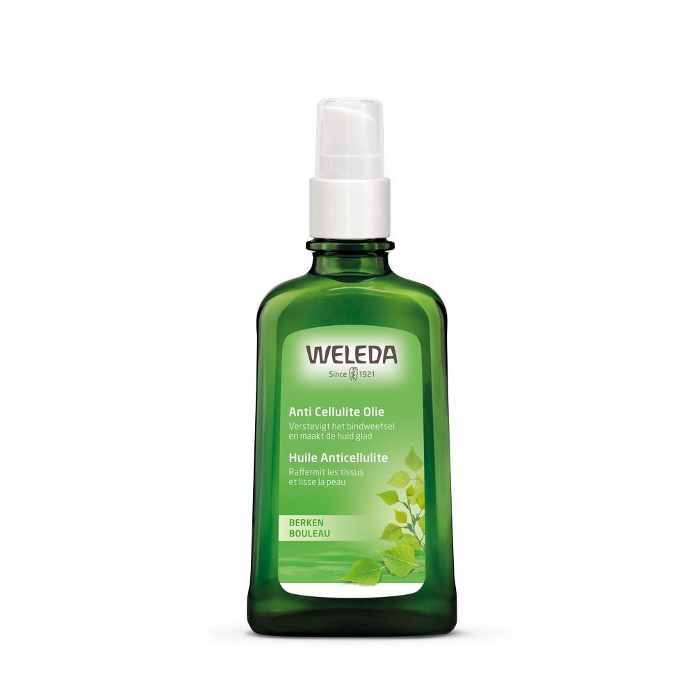 Flacon vert avec vaporisateur blanc. Étiquette avec nom du produit et feuilles. Marque Weleda.