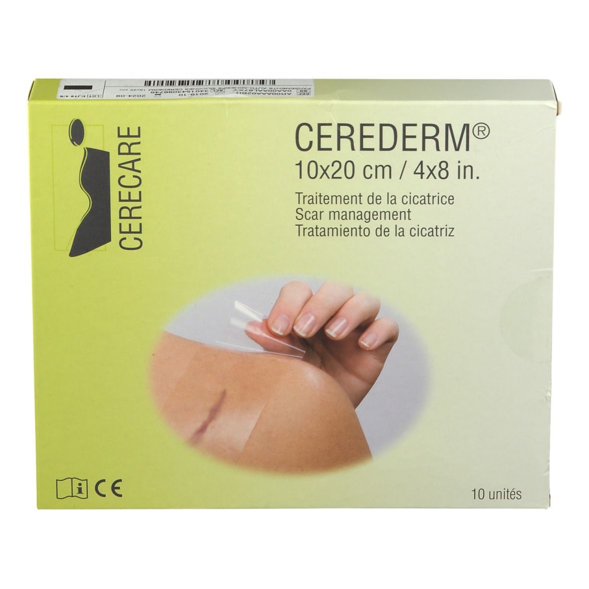 Boîte Cerederm avec pansements. Inscription : 10x20 cm, traitement des cicatrices. Main avec pansement sur peau. 10 unités.