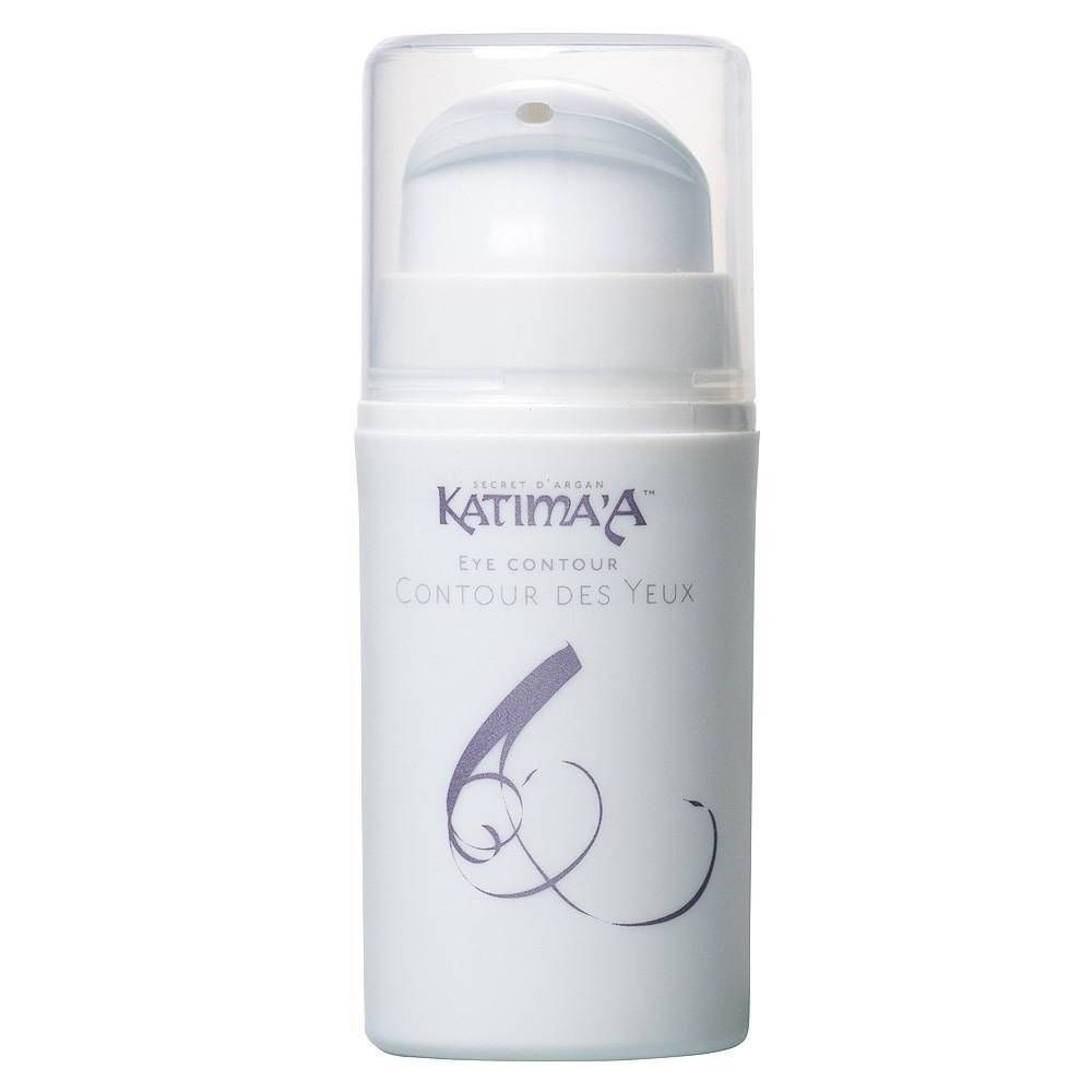 Witte flacon met pomp en transparante dop. Opschrift: Katima'a, Eye Contour, Contour des Yeux.