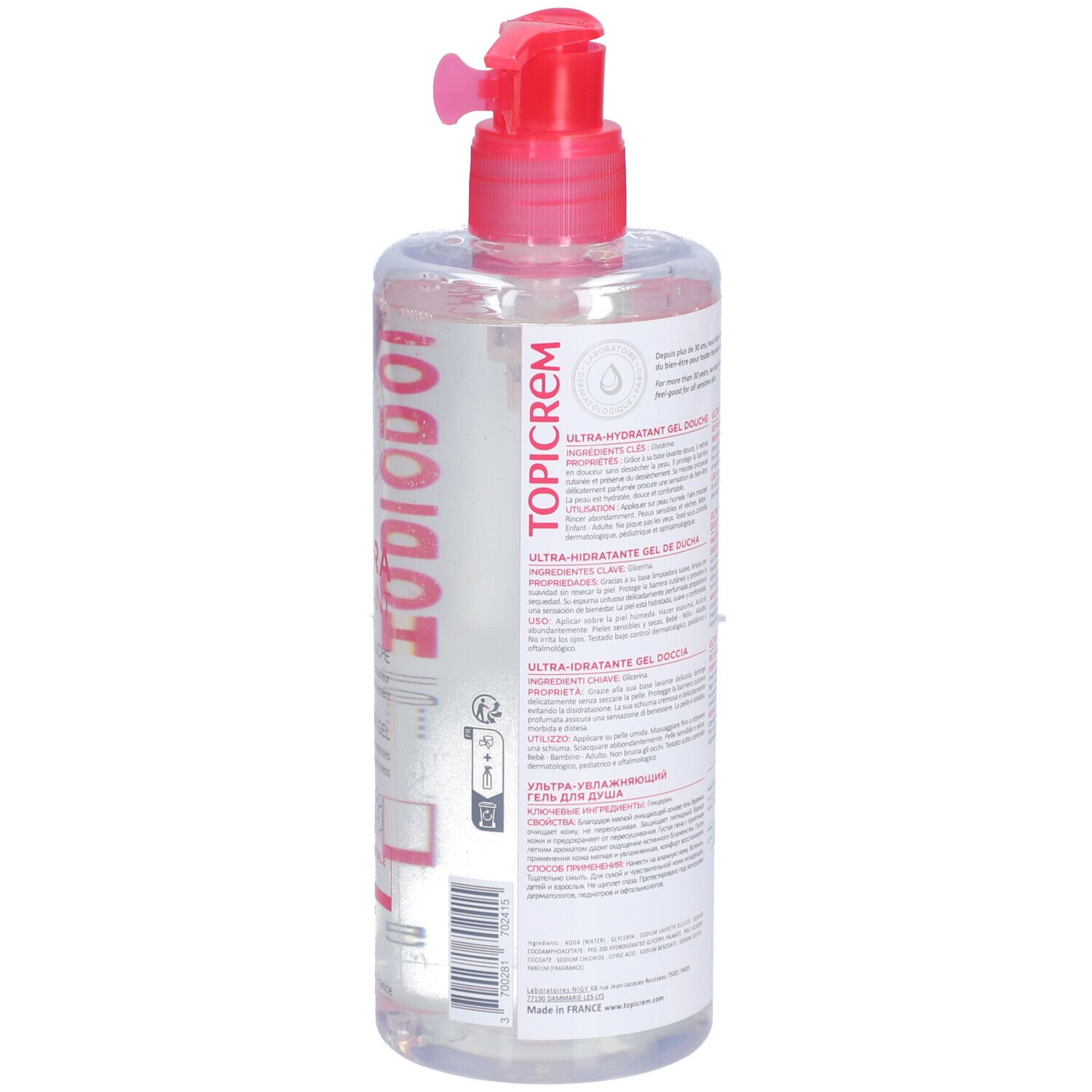 Dos d'un flacon transparent avec liquide rose. Inscriptions: TOPICREM, informations produit en plusieurs langues.