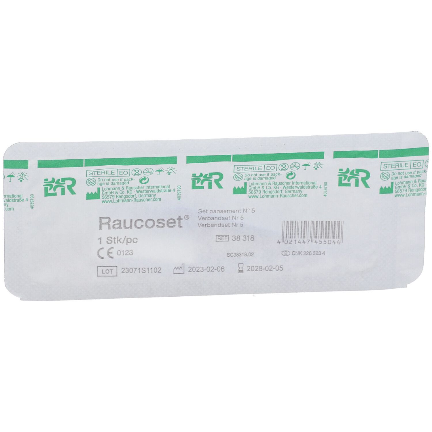 Emballage de Raucoset. Blanc avec des accents verts. Contient des informations telles que "1 Stk/pc", marquage CE et date d'expiration.