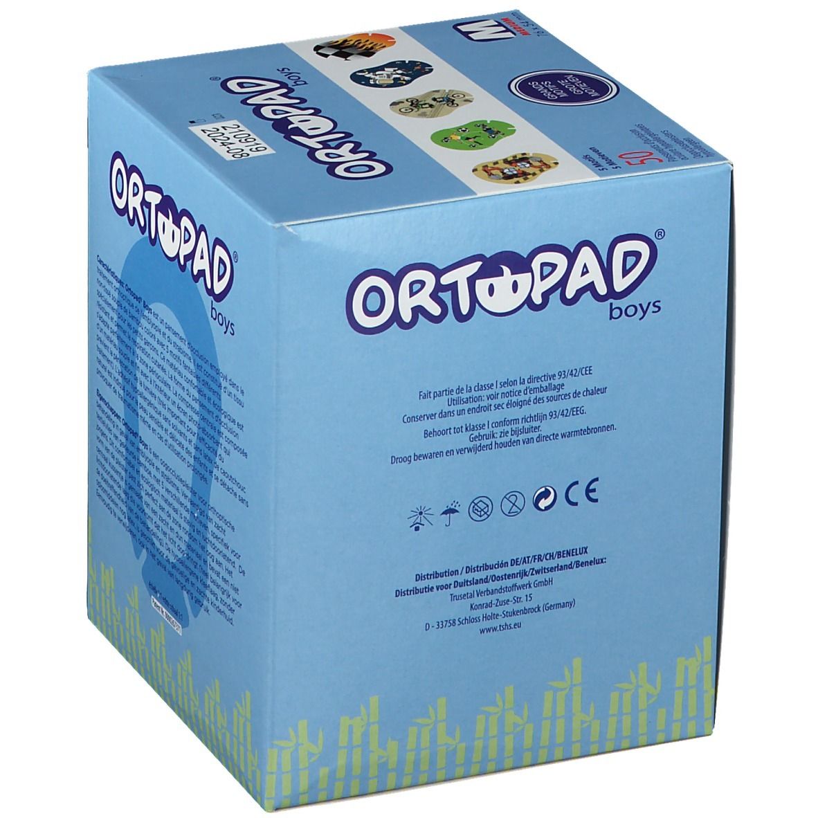 Boîte bleue "ORTOPAD boys". Contient des pansements oculaires. Texte multilingue. Avec marquage CE.