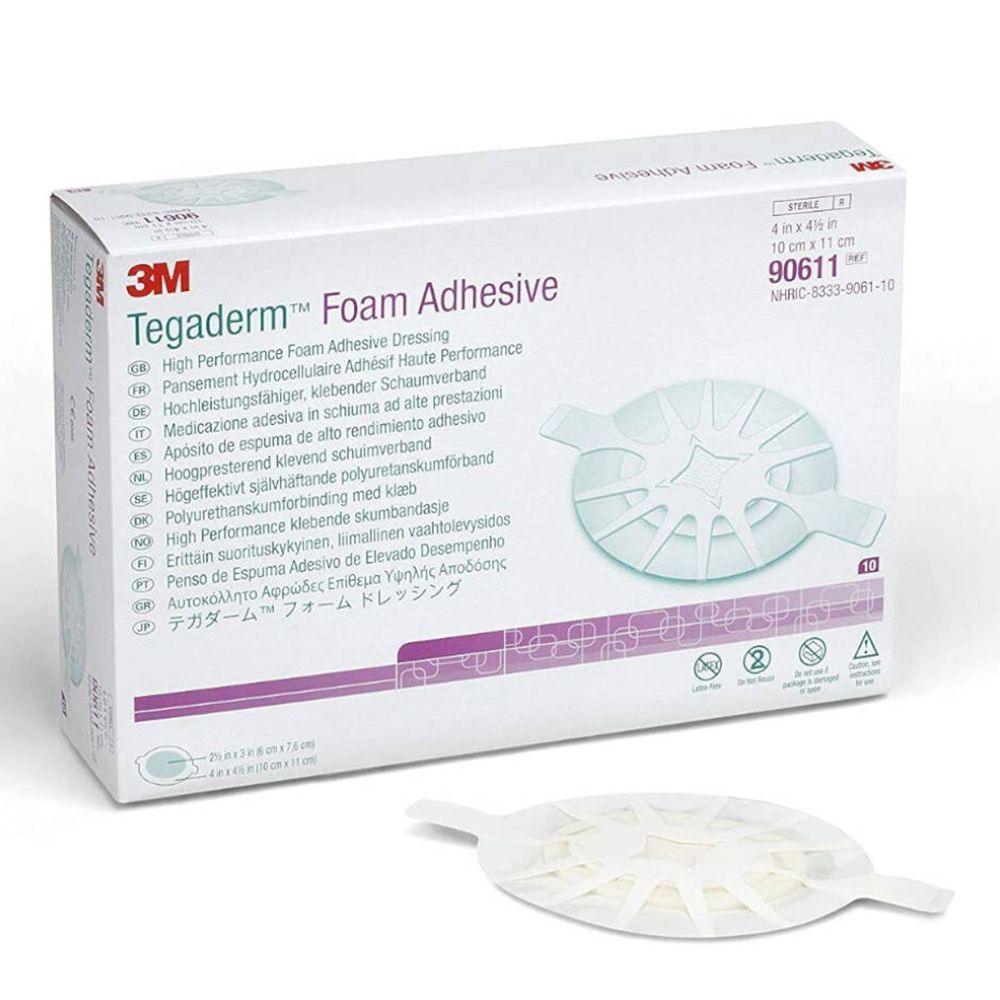 Boîte de 3M Tegaderm Foam Adhesive. Contient 10 pièces. Dimensions : 10 cm x 11 cm. Nom du produit et marque visibles.