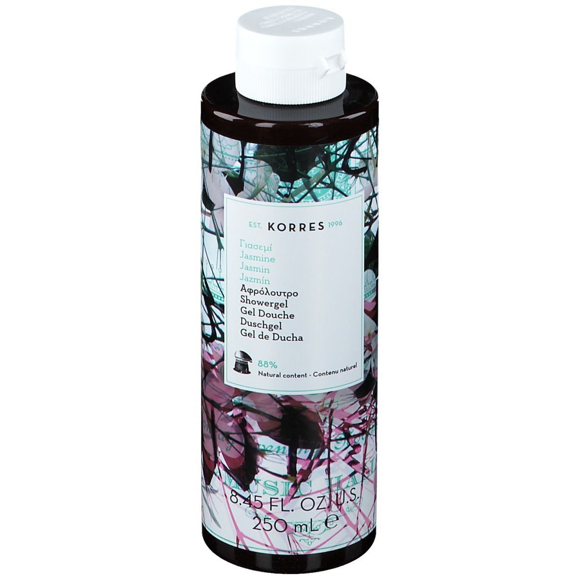 Gel douche KORRES Jasmine. Flacon cylindrique, bouchon blanc. Étiquette avec nom du produit et motif floral. 250 ml.