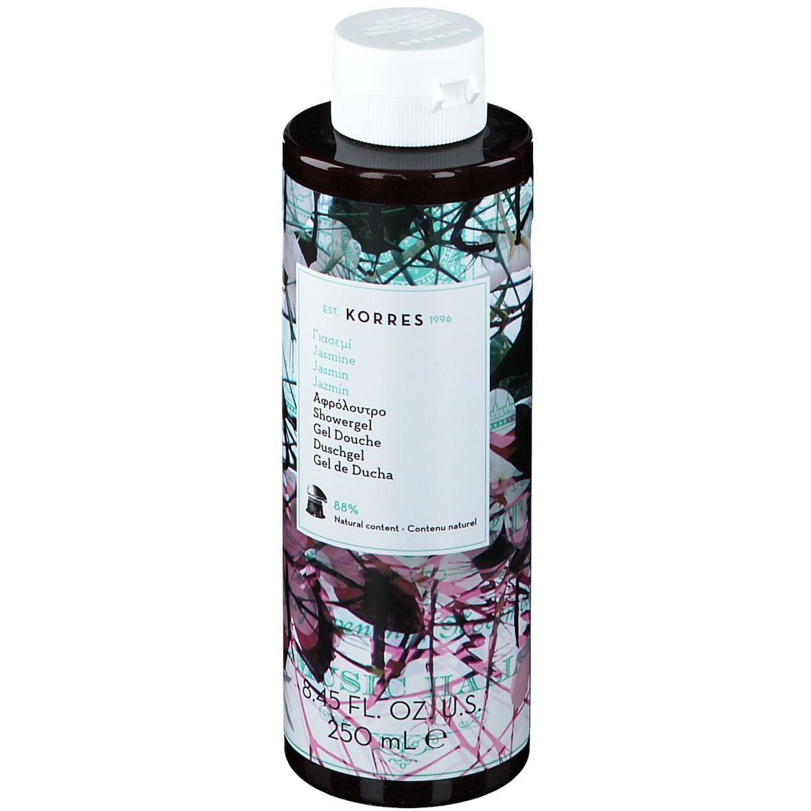 Gel douche KORRES Jasmine. Flacon cylindrique, bouchon blanc. Étiquette avec nom du produit et motif floral. 250 ml.