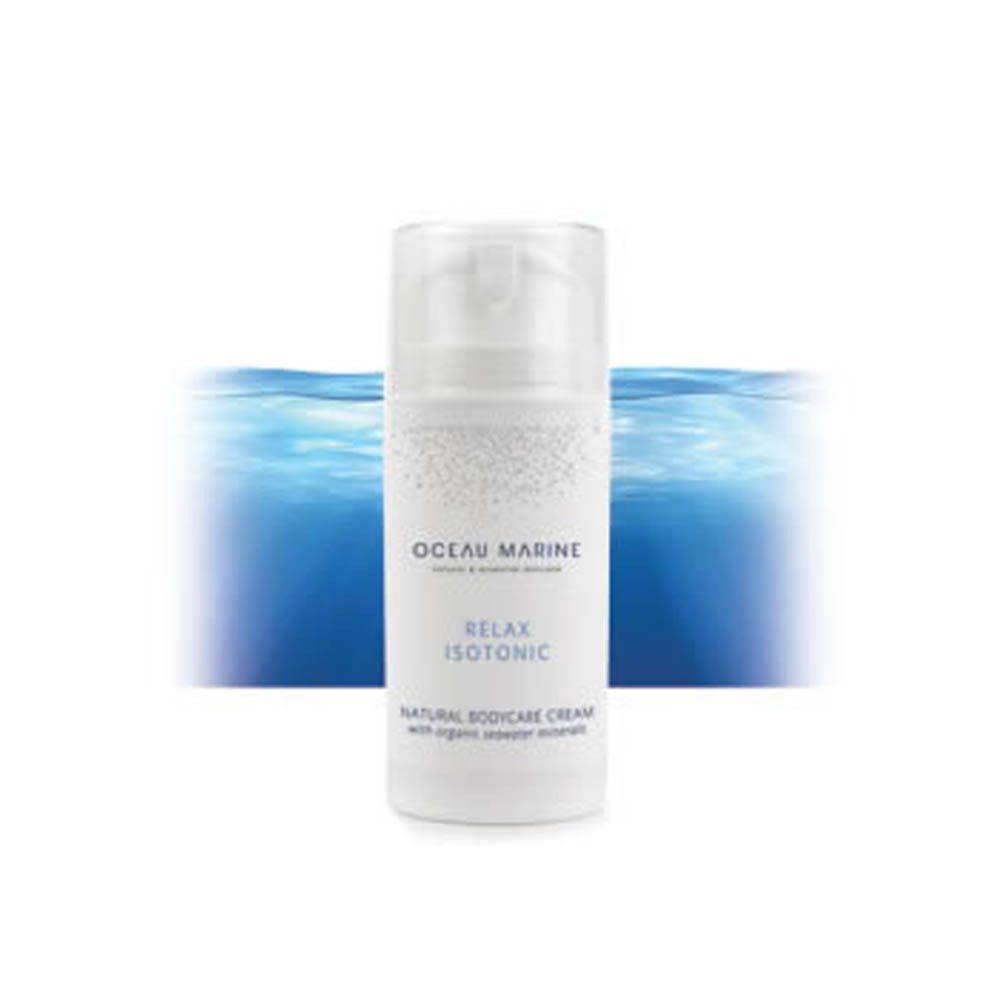 Flacon de crème Oceau Marine Relax Isotonic. Flacon blanc sur fond bleu.