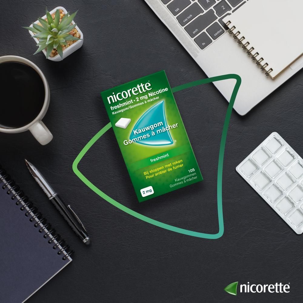 Vrouw op hometrainer. Nicorette logo.