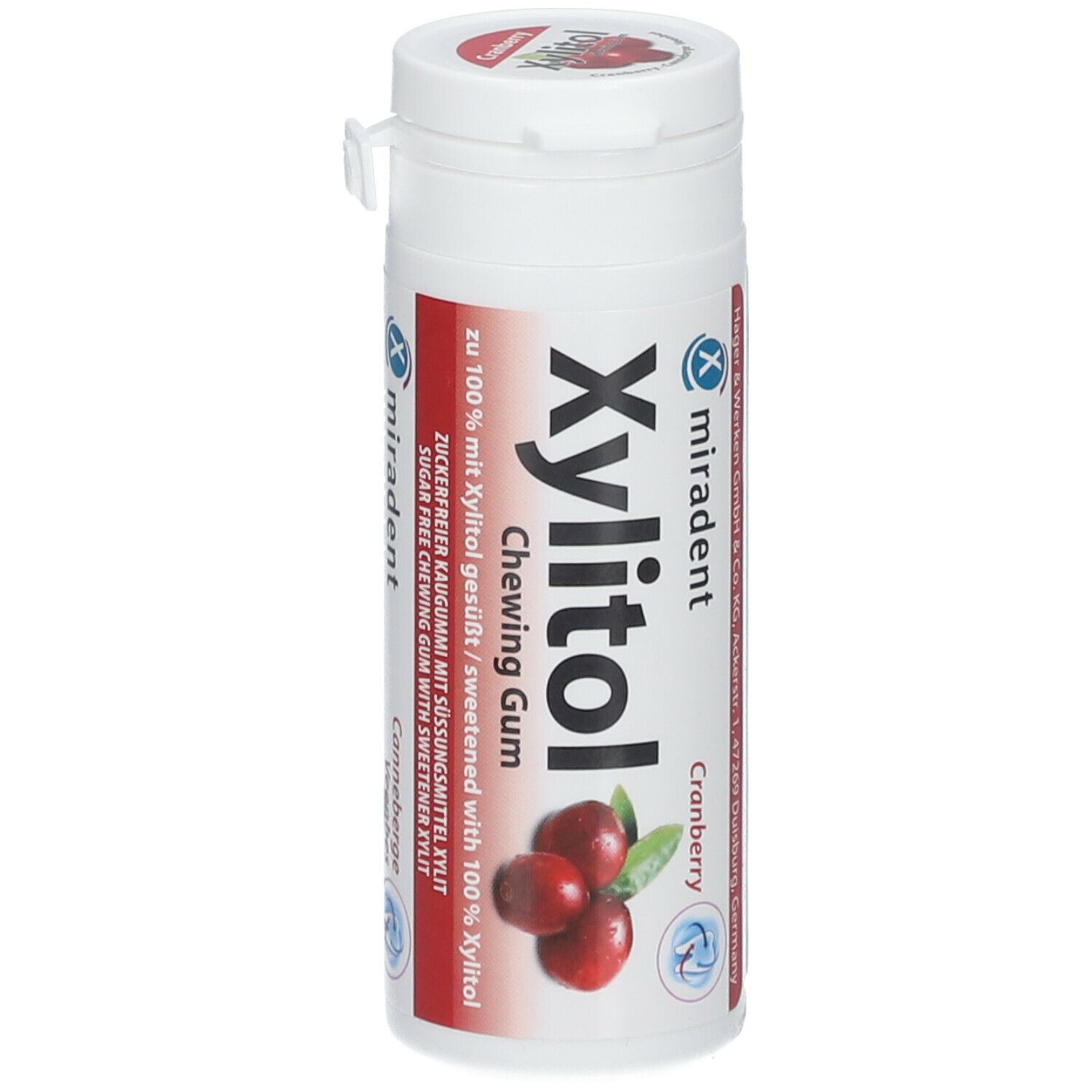 Witte cilindrische doos met Miradent Xylitol kauwgom. Cranberry-illustratie. Tekst: Suikervrije kauwgom met zoetstof xylitol.