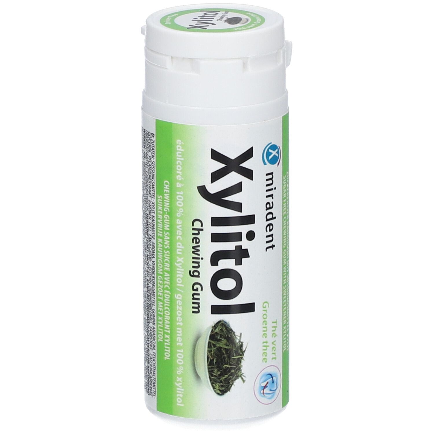Flacon blanc avec étiquette verte. Inscription : Xylitol Chewing Gum, Thé Vert. Logo Miradent.