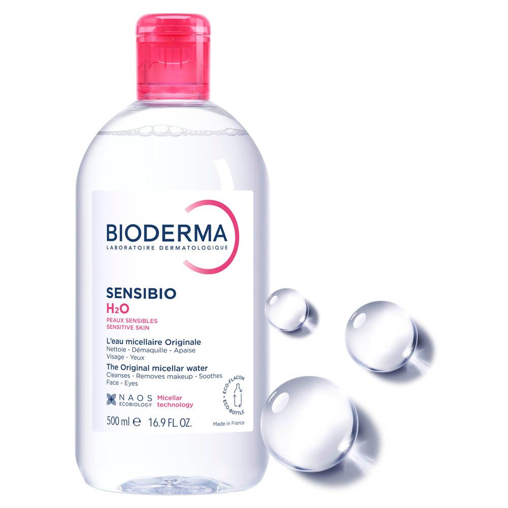 BIODERMA Sensibio H2O. Fles met roze dop. Heldere vloeistof. Opschrift Sensibio H2O en logo.