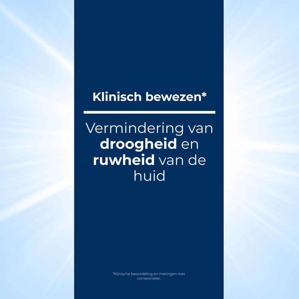 Tekst: Klinisch bewezen. Vermindering van droogheid en ruwheid van de huid.