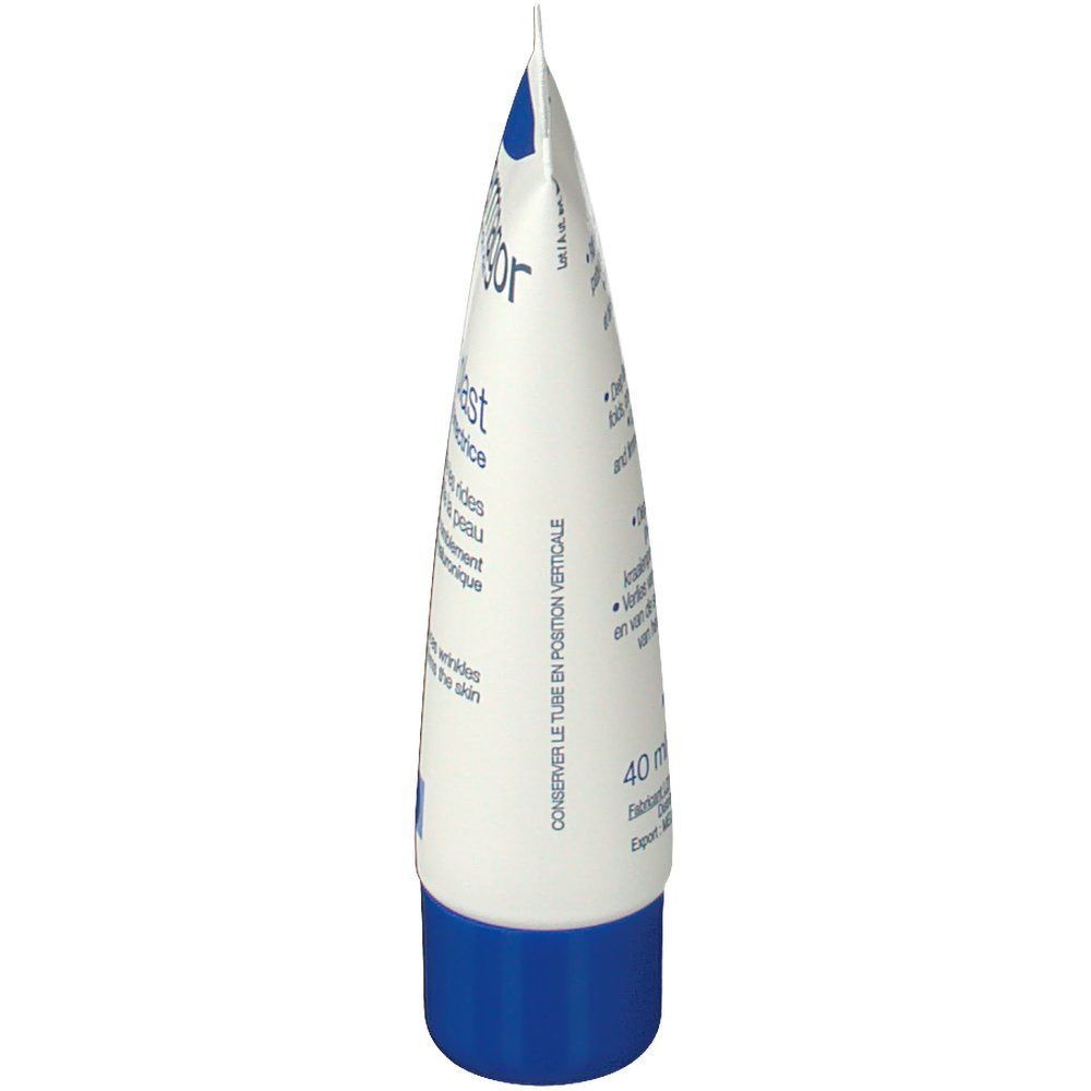 Tube de crème blanc avec bouchon bleu. Inscription Dermagor. Vue verticale.