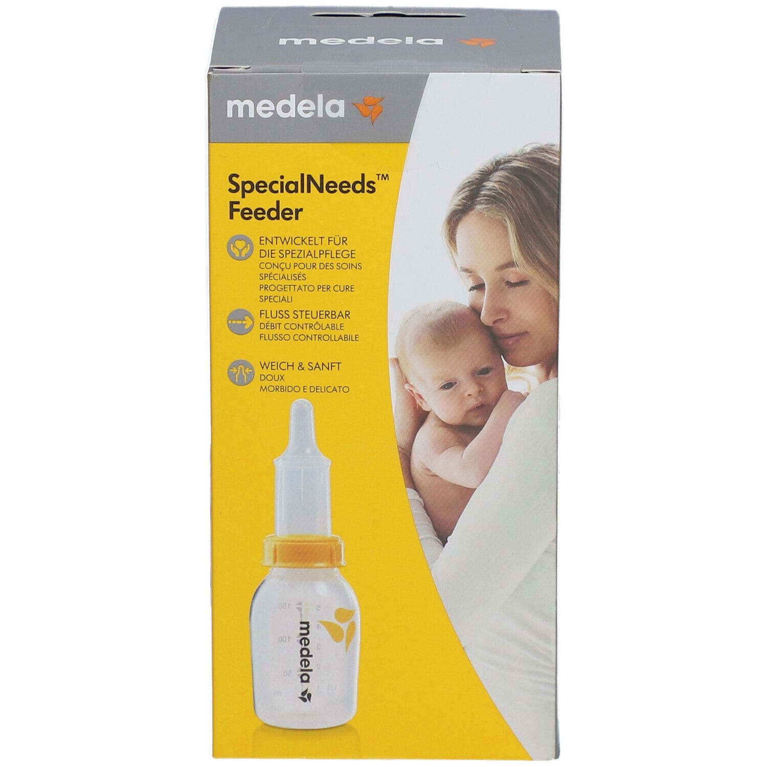 Verpackung der Medela SpecialNeeds Feeder. Auf der Vorderseite sind eine Mutter und ein Baby abgebildet. Das Produkt ist in der Verpackung abgebildet.