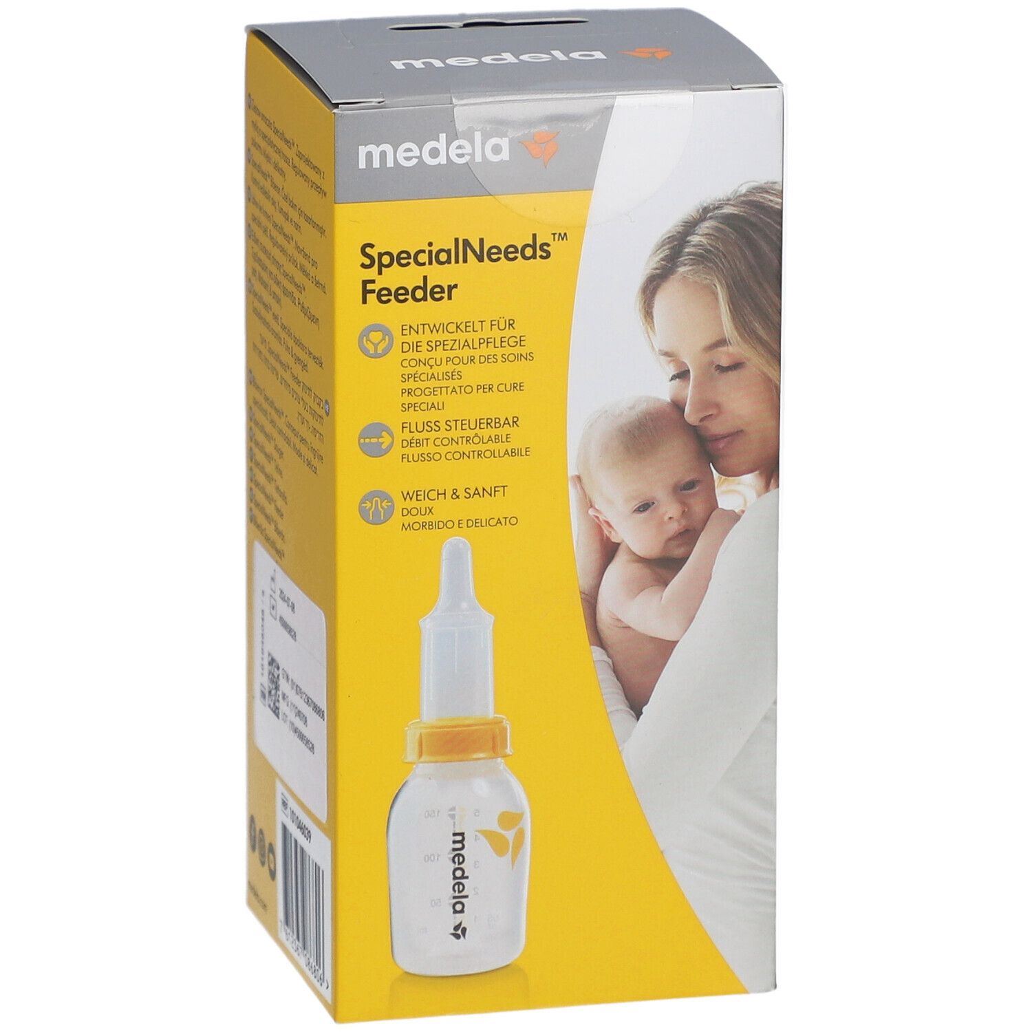 Verpackung der Medela SpecialNeeds Feeder. Auf der Vorderseite sind eine Mutter und ein Baby abgebildet. Das Produkt ist in der Verpackung abgebildet.