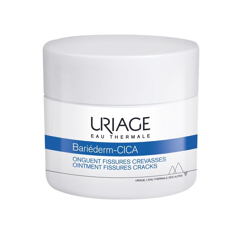 Witte pot met deksel. Blauwe band met Uriage Bariéderm. Productnaam en tekst.