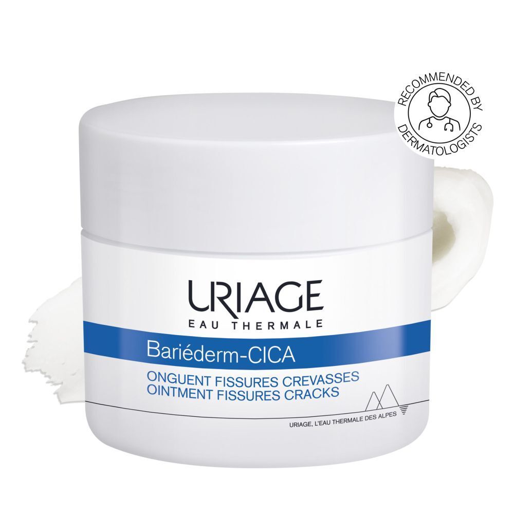 Witte pot met deksel. Blauwe band met Uriage Bariéderm. Productnaam en tekst.