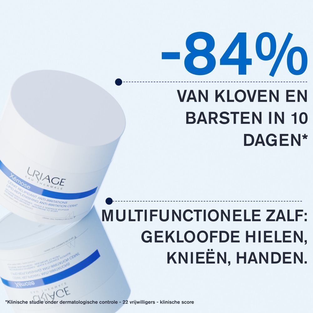 Witte pot met deksel. Blauwe band met Uriage Bariéderm. Productnaam en tekst.