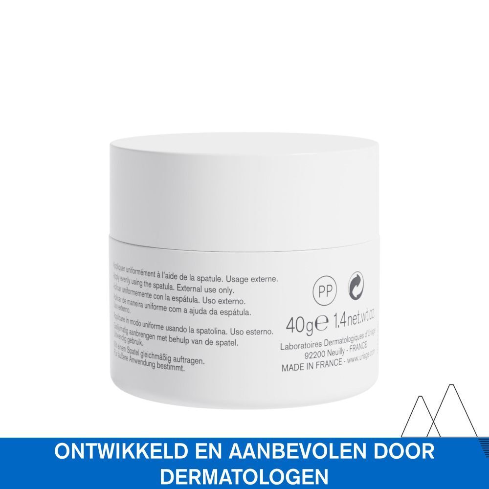 Witte pot met deksel. Blauwe band met Uriage Bariéderm. Productnaam en tekst.