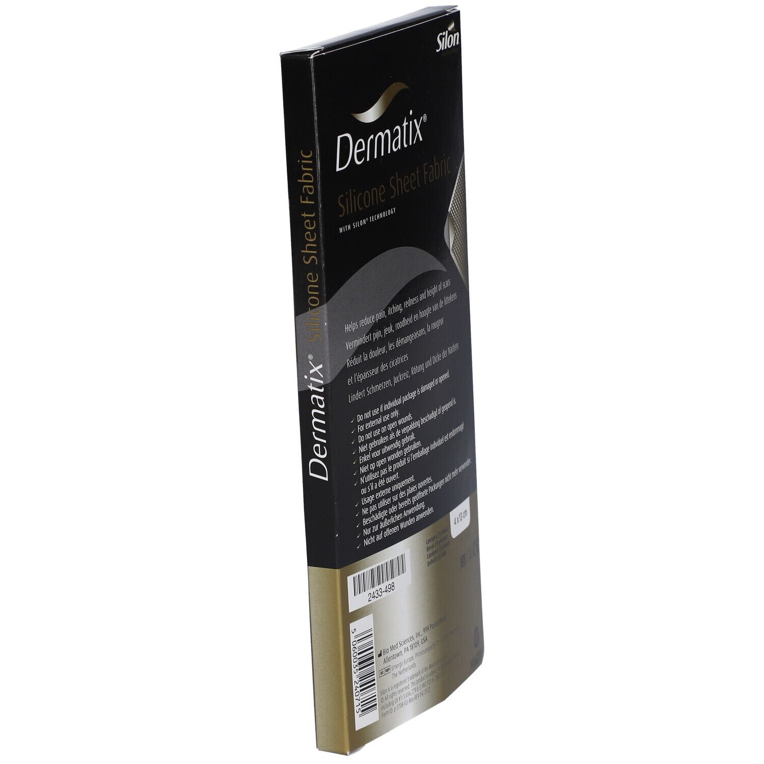 Vue latérale de l'emballage Dermatix Silicone Sheet Fabric. Boîte noire avec nom du produit et texte. Fond gris argenté.