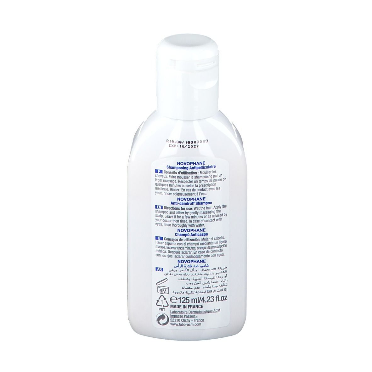 Rückseite einer weißen Flasche. Text in mehreren Sprachen, darunter Französisch und Englisch.