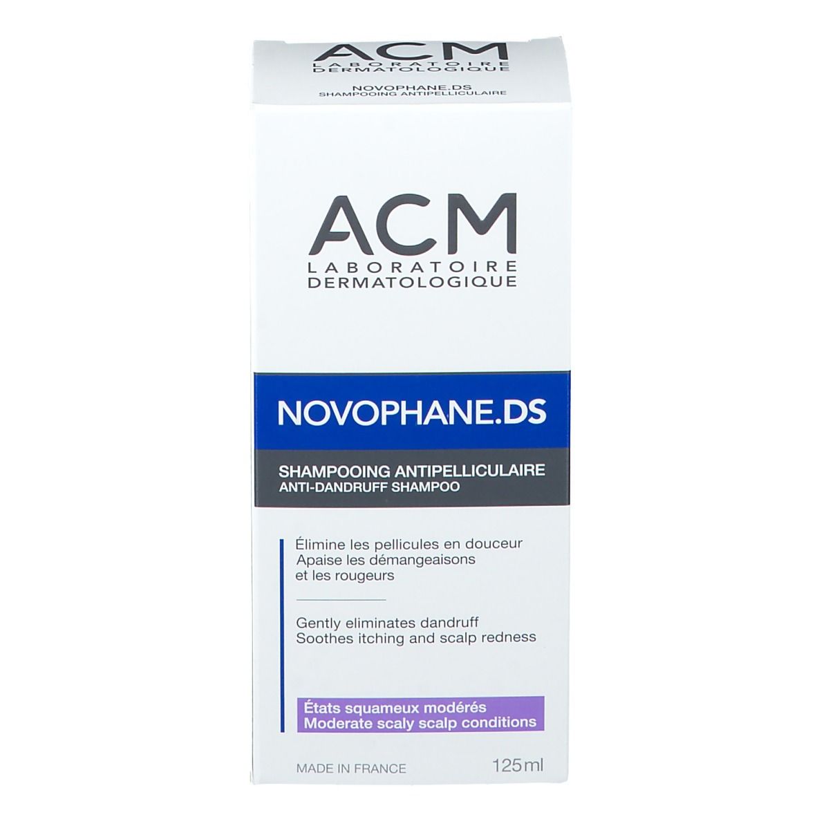 Scatola bianca di shampoo Novophane.DS ACM. Etichette blu e viola. Testo descrittivo.