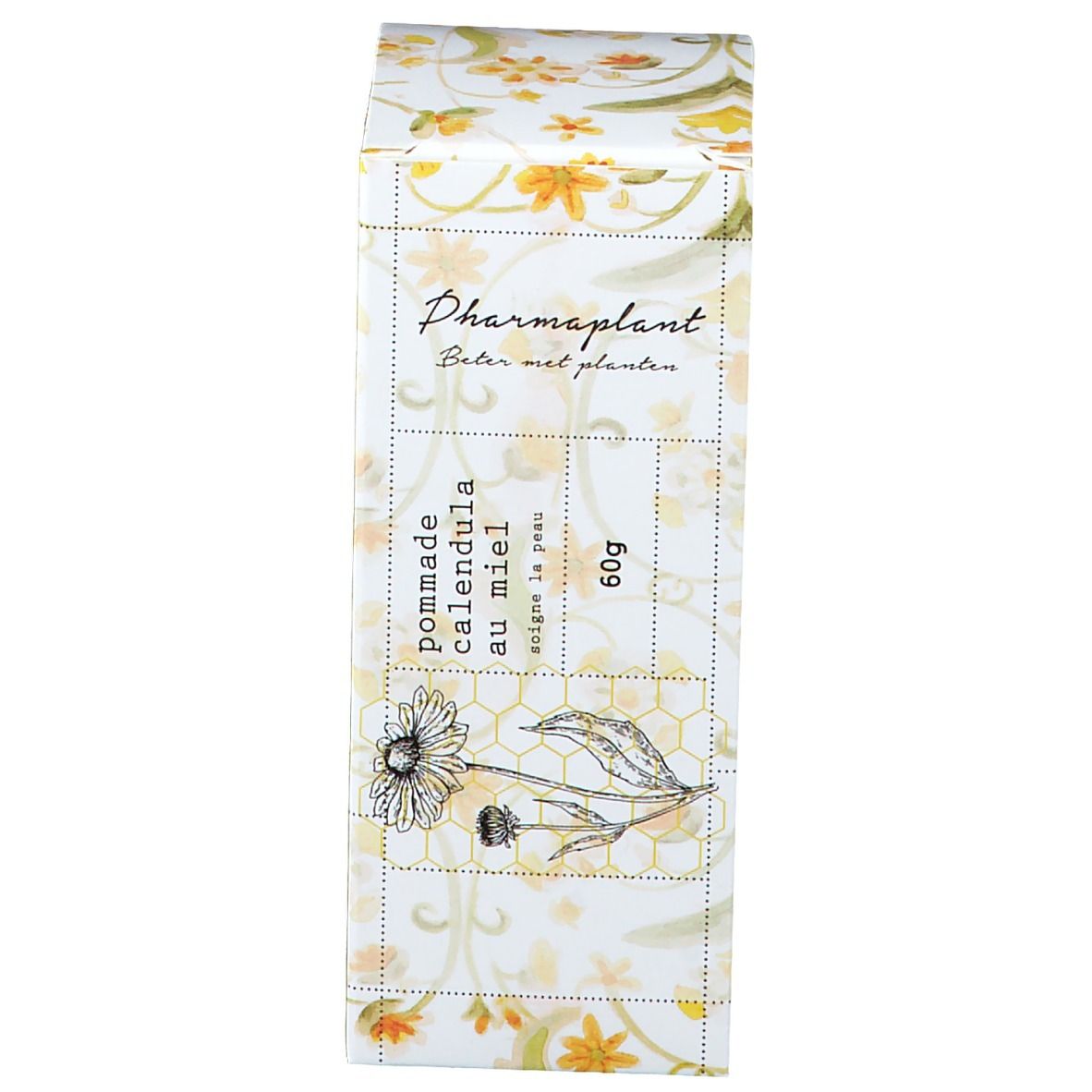 Verpakking met bloemmotief. Opschrift: Pharmaplant, Calendula Honig Salbe, 60g.