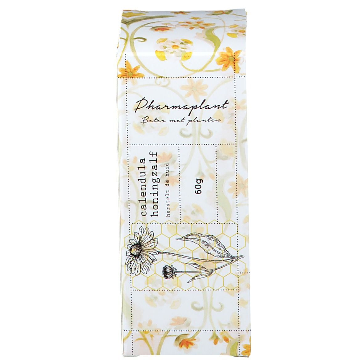 Verpakking met bloemmotief. Opschrift: Pharmaplant, Calendula Honig Salbe, 60g.