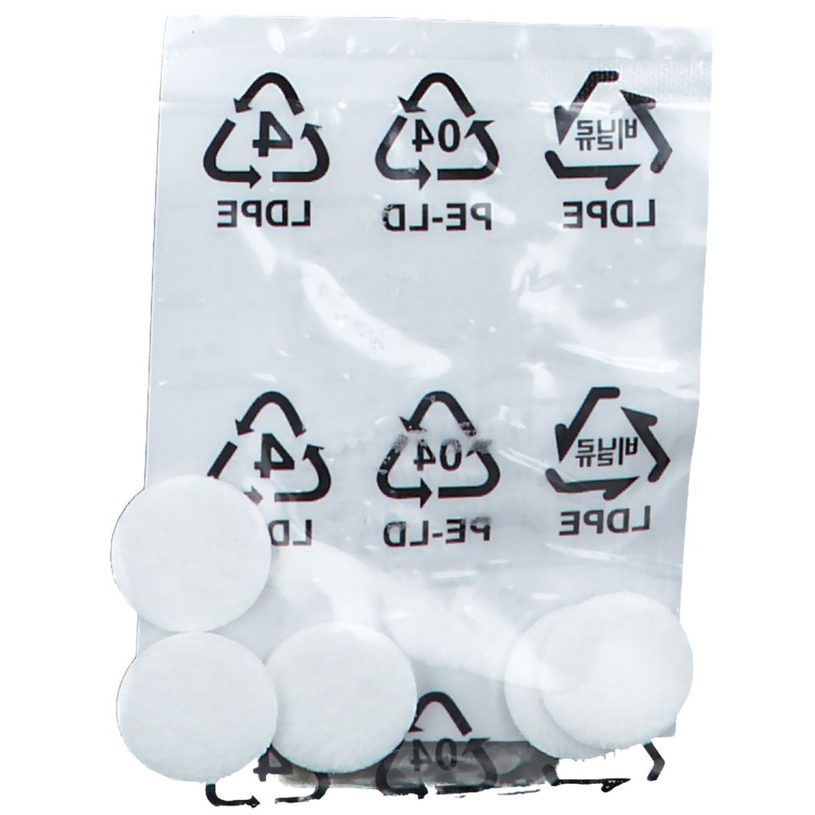 Emballage avec filtres ronds blancs. Six filtres visibles. Symboles de recyclage sur l'emballage.