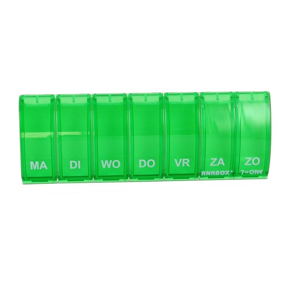 Groene pillendoos met zeven compartimenten, gelabeld met dagen van de week. "ANABOX" en "7-ONE" zijn zichtbaar.