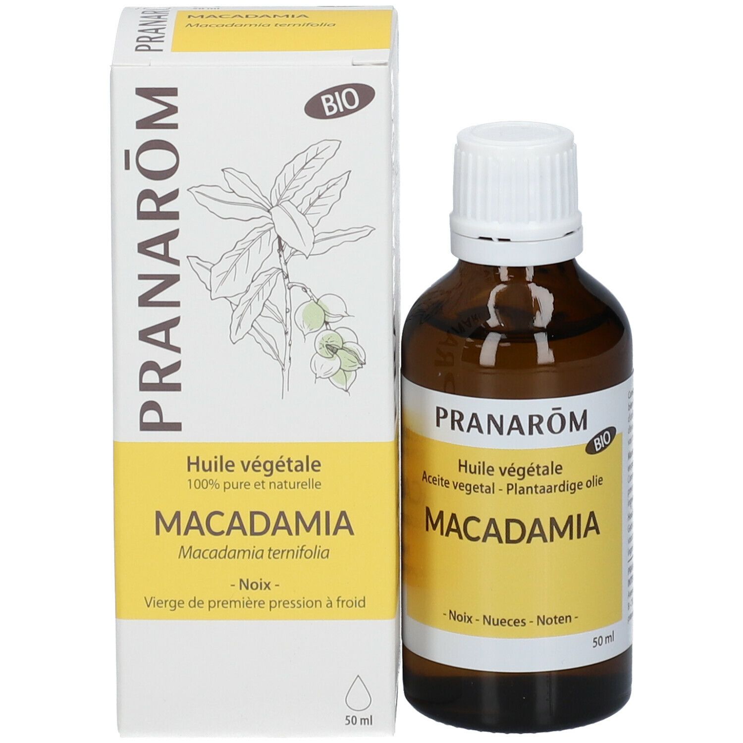 Emballage et flacon. Emballage: boîte blanche avec texte: Pranarôm, Macadamia. Flacon: verre brun, bouchon blanc.