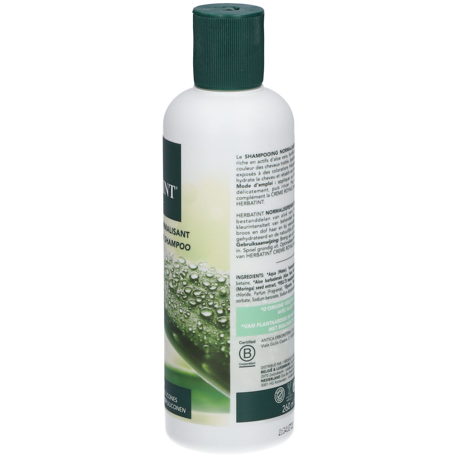 Dos d'un flacon blanc avec bouchon vert. Texte en plusieurs langues. Inscription: Herbatint, Shampooing normalisant.