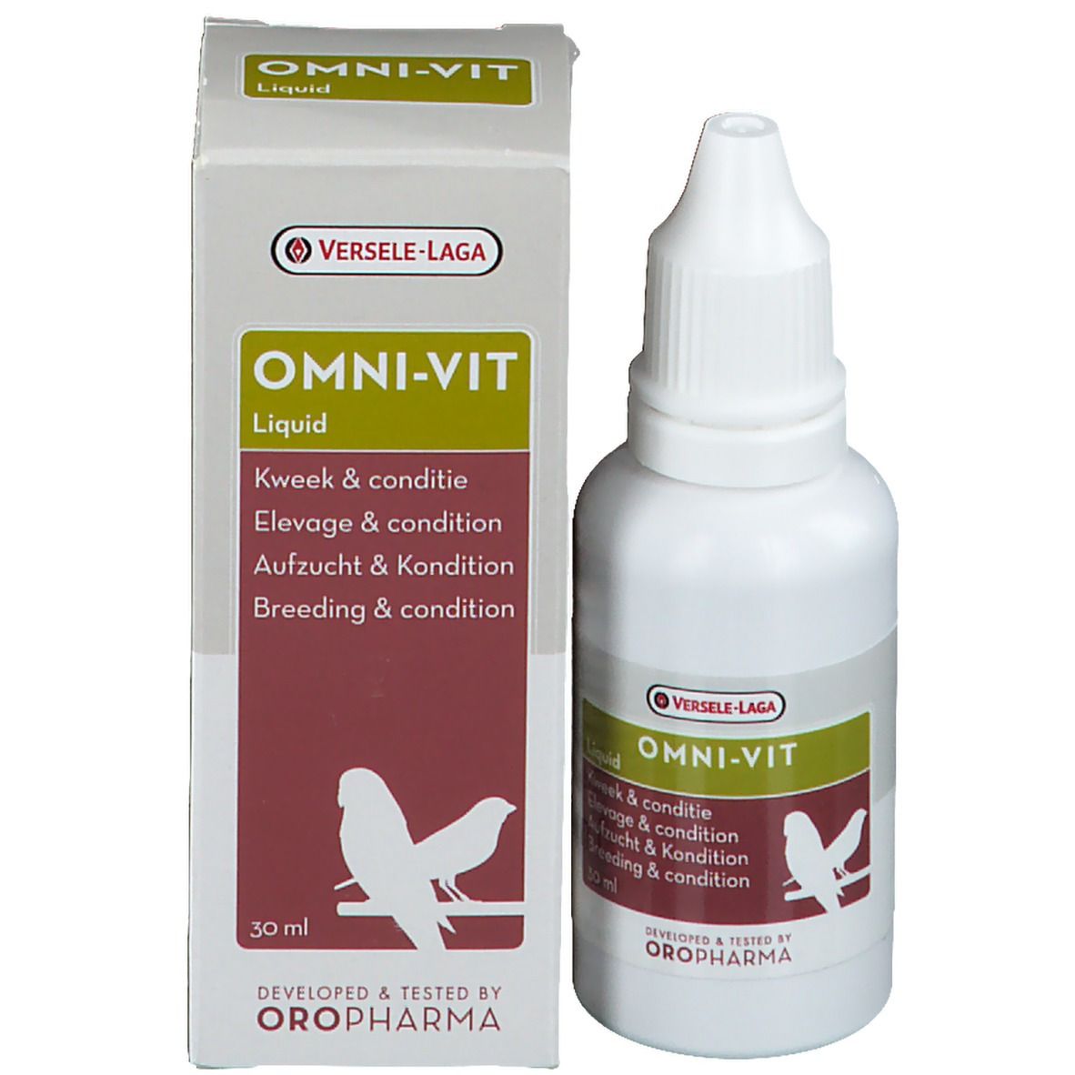 Emballage du produit avec flacon. Inscription: OMNI-VIT Liquid. Marque: Versele-Laga. Flacon avec bouchon compte-gouttes.