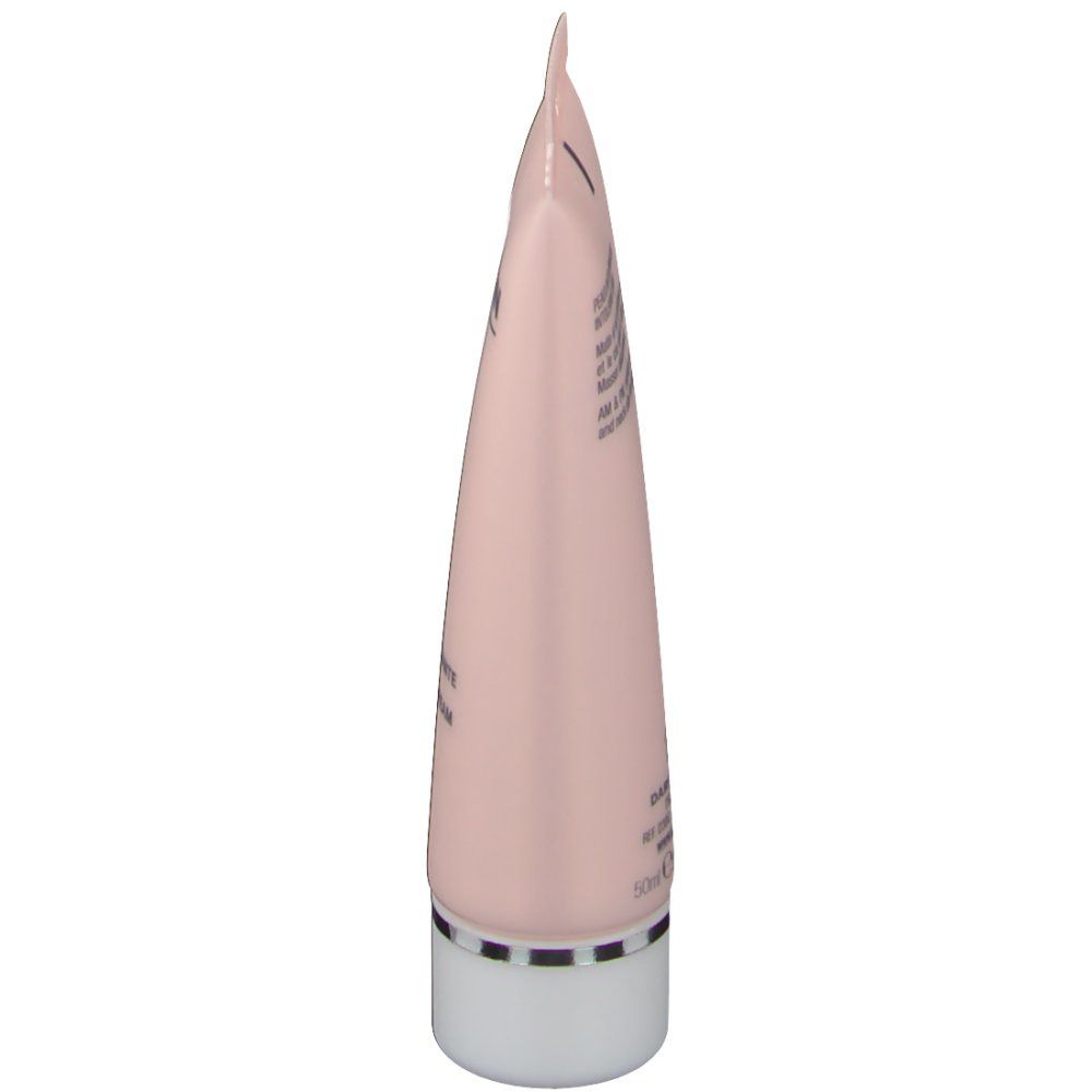 Vue latérale du tube rose avec bouchon blanc. Texte sur le tube.
