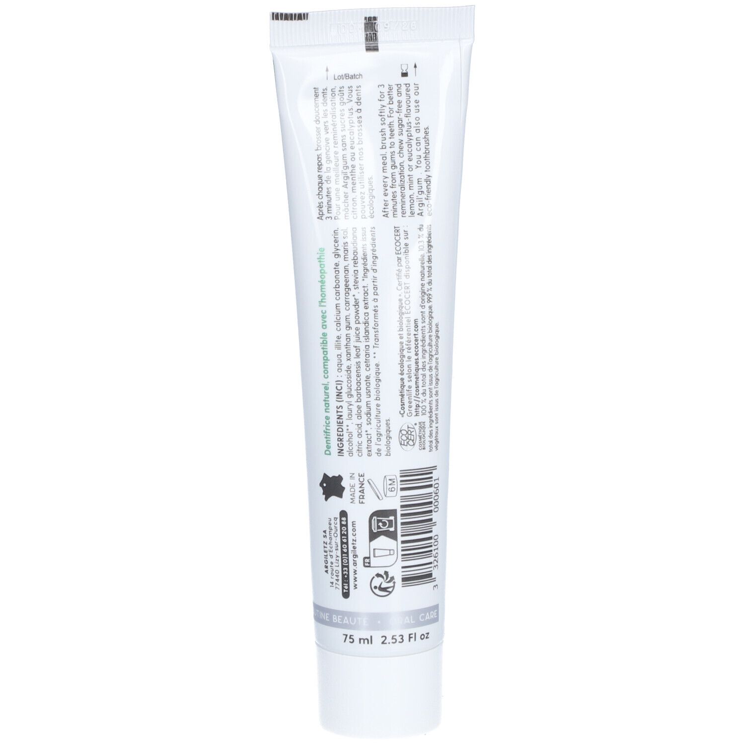 Rückseite einer Zahncreme-Tube. Text in mehreren Sprachen. Informationen zu Inhaltsstoffen, Hersteller und Zertifizierungen.