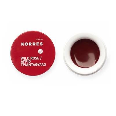 Rode pot met lippenboter en deksel. Op de deksel staat "KORRES" en "Wild Rose".