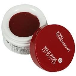 Rode deksel en witte pot met lippenboter. Op de deksel staat "Wild Rose Lip Butter".